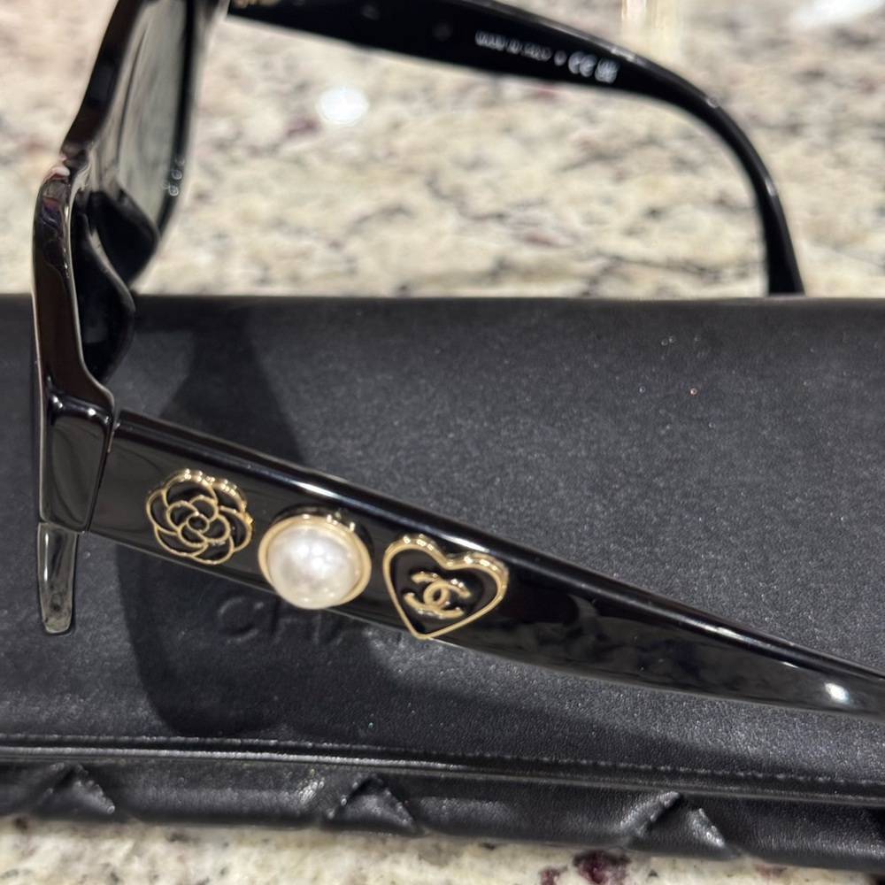 CHANEL Black and Gold Sunglasses with Signature Embellishments - Picture 2 of 5